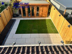 Porcelain tiles and turf on a small garden